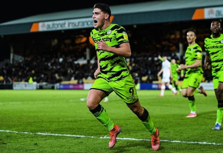 Forest Green Rovers run on the football pitch